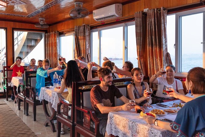 Halong Bay Day Tour With Titop Island, Cave, Kayak & Lunch - Guides, group size, and organization