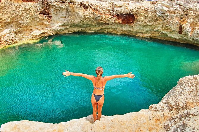 Hidden Cenote Swim & ATV Jungle Adventure with Transportation - Riding the Can-Am Outlander through the forest