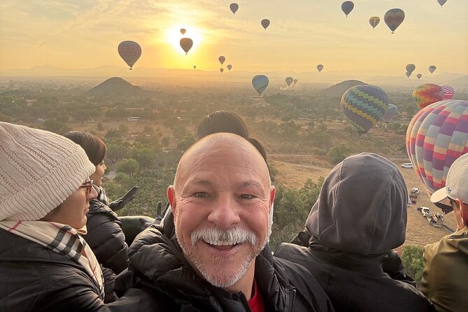 Hot Air Balloon Flight with Breakfast Cave and Pyramids Tour - Walking through Teotihuacan after seeing it from above