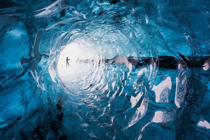 Ice Cave Tour in the National Park of Vatnajökull - Walking across rough ground to the cave