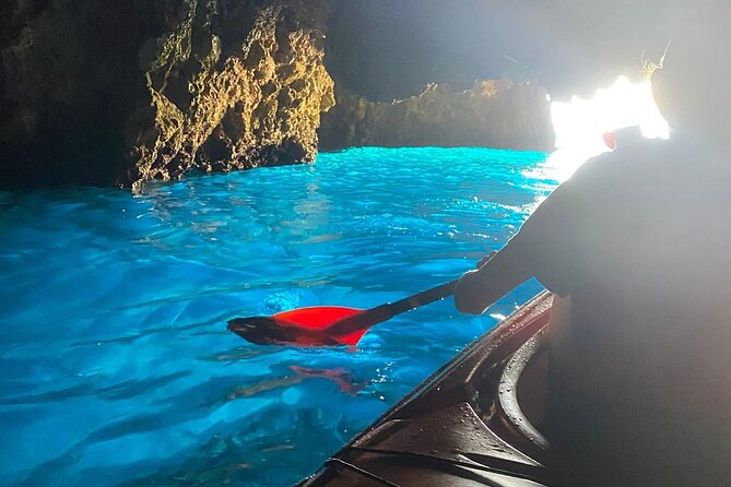 Kayak Trip to Hidden blue Cave, with lunch & fruits. - Remote beaches, swimming, and snorkeling