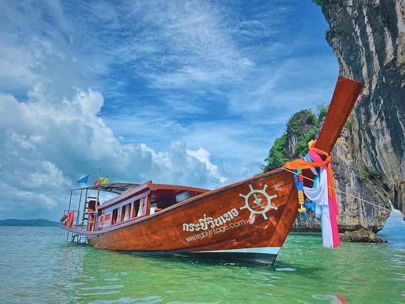 Krabi: Railay Phra Nang & Diamond Cave Sunset Plankton Tour - A scenic boat ride into Phai Plong Bay