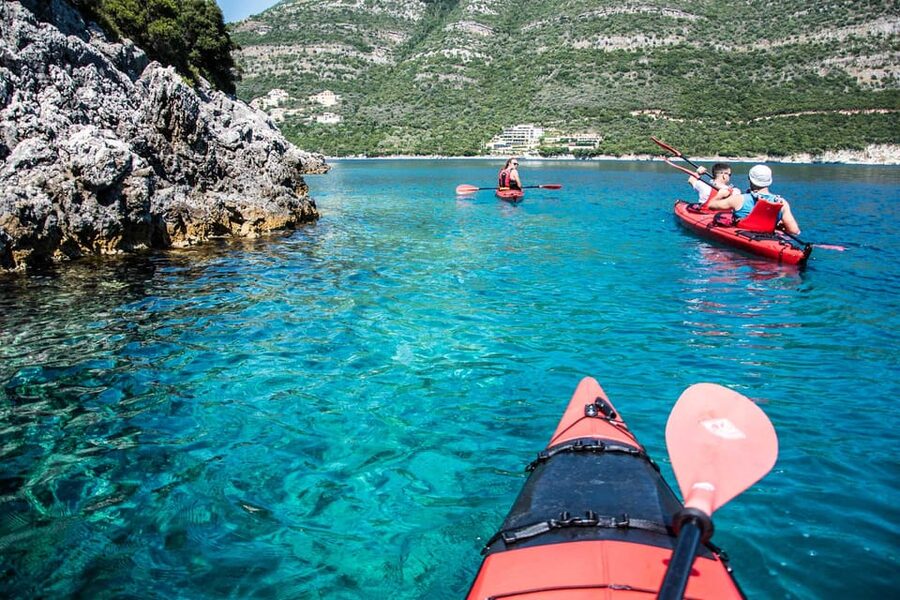 Lefkada: Blue Cave Kayak Tour with a Taste of Greece - Snorkeling among fish and red starfish