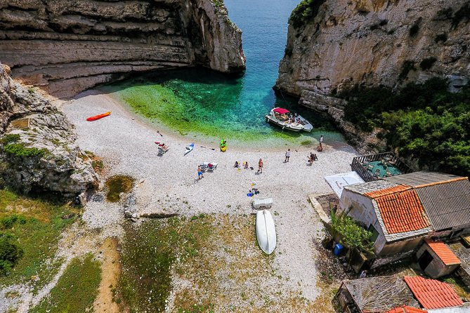 Luxury Blue Cave, Hvar and Vis Boat Tour from Split and Brac - Entering the Blue Cave near Bisevo