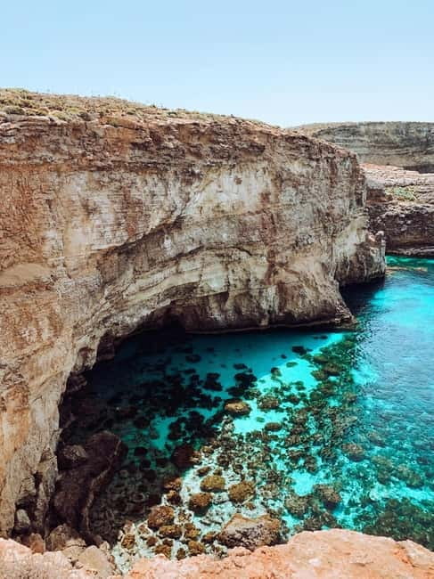 Malta: Private Boat Cruise with Caves, Beaches & Swim Stops - Comino and the Blue Lagoon: beautiful, but busy