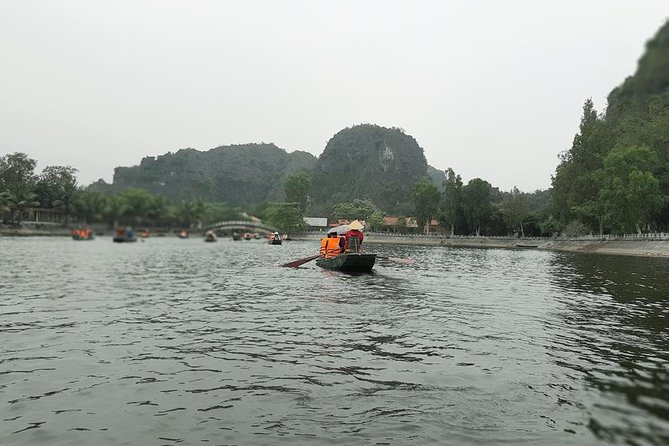 Ninh Binh Full-Day Tour from Hanoi to Hoa Lu, Tam Coc & Mua Cave Via Boat & Bike - The guide and group experience