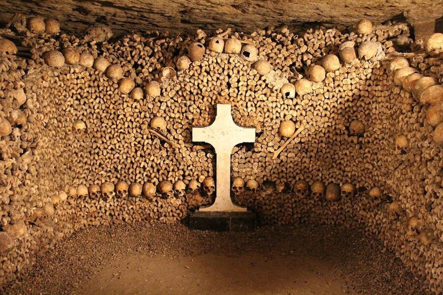 Paris: Catacombs Entry & Seine River Cruise with Audio Guide - Entering the Catacombs 20 meters below Paris