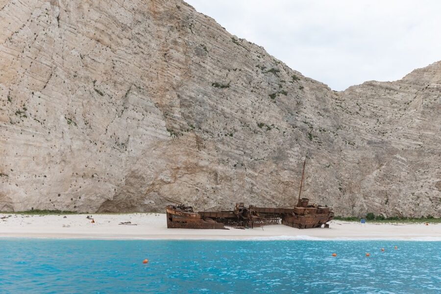 Porto Vromi: Shipwreck, Caves, & White Beach Swimming Cruise - White Beach looks beautiful, but watch your footing