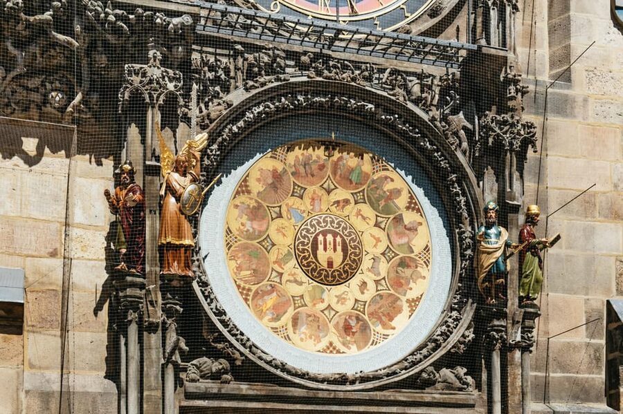 Prague: Old Town, Astronomical Clock and Underground Tour - Crossing Charles Bridge with stories, not just photographs