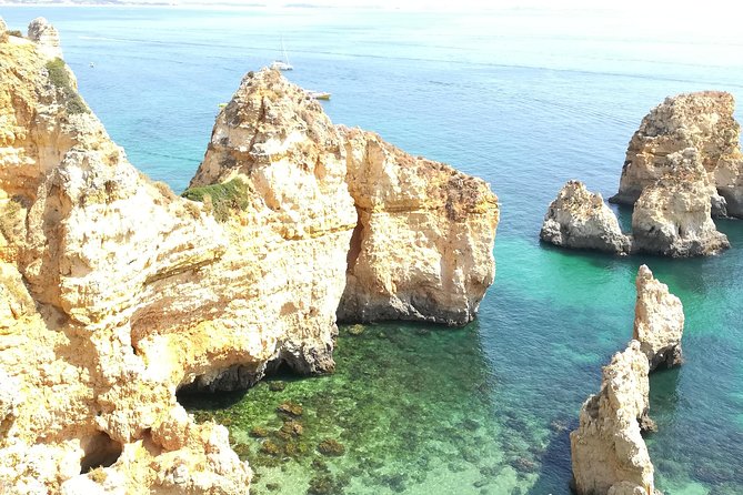 Private Algarve: Benagil Caves, Lagos Cliffs & Hidden Beaches - Praia dos Estudantes and its stone bridge