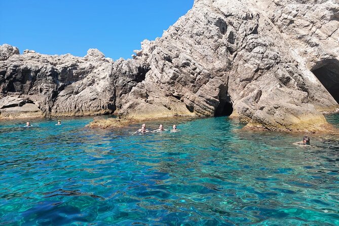 Private boat tour- explore the islands, find hidden caves and try snorkelling - Who will enjoy this day most