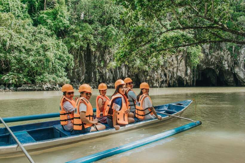 Puerto Princesa: Underground River, Zipline, Paddleboat Tour - Sabang wharf and the boat to the cave