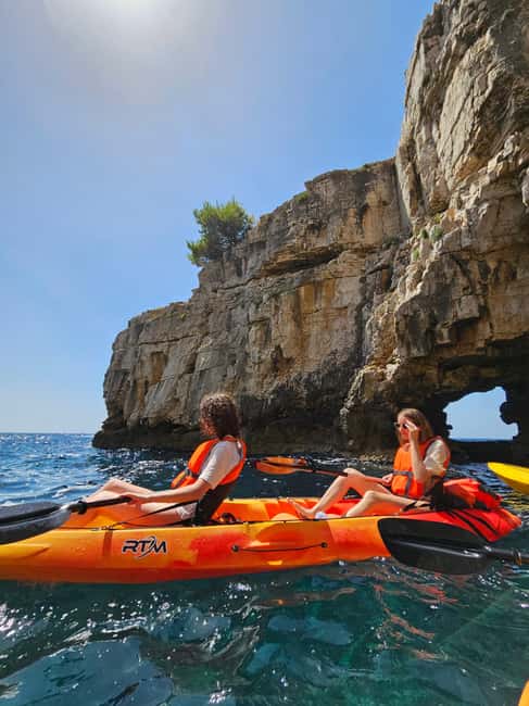 Pula: Cave Kayak Tour, Snorkeling and Island Jumping - Snorkeling in clear Adriatic water