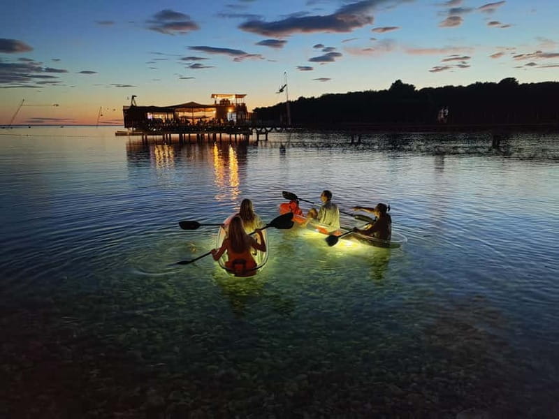 Pula: Cave Sunset/Night Tour in Transparent Kayak - Paddling through coves, cliffs, and coastal scenery