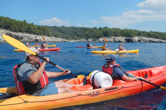 Pula Kayak, Cliffs & Snorkeling Adventure - Paddling toward Pula’s cliffs and former military zone