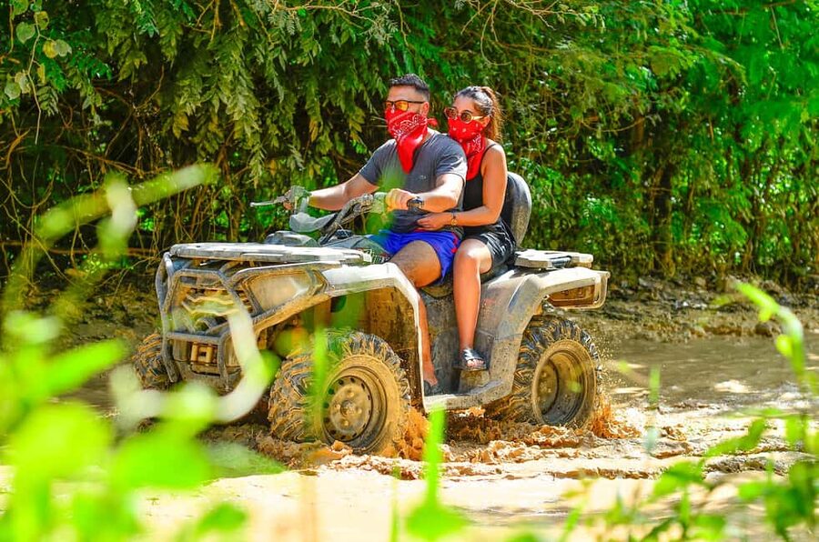 Punta Cana: Buggy or ATV Tour on the Beach and Cenote Visit - Macao Beach, with clear water and a short stop