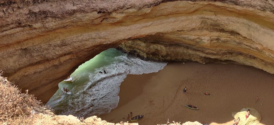 Quarteira: Benagil Cave Guided Catamaran Day Cruise & Drink - Reaching Benagil Cave by catamaran