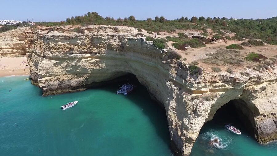 Quarteira: Benagil Cave Guided Catamaran Day Cruise & Drink - The return trip, free drink, and possible swim