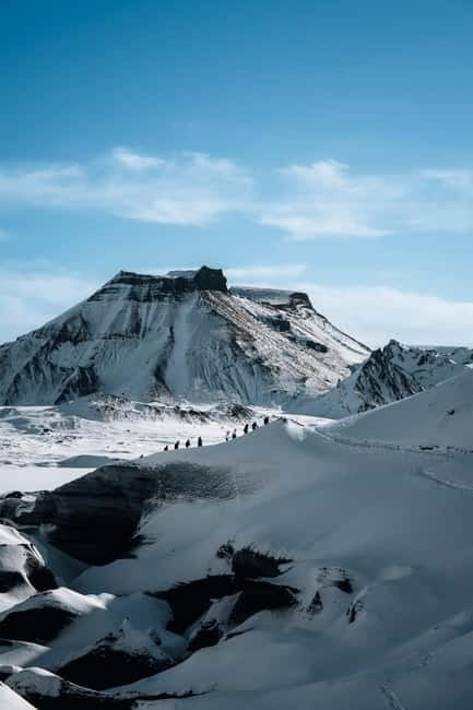 Reykjavik: Katla Ice Cave & South Coast Tour - Katla Ice Cave: blue ice with black volcanic stripes