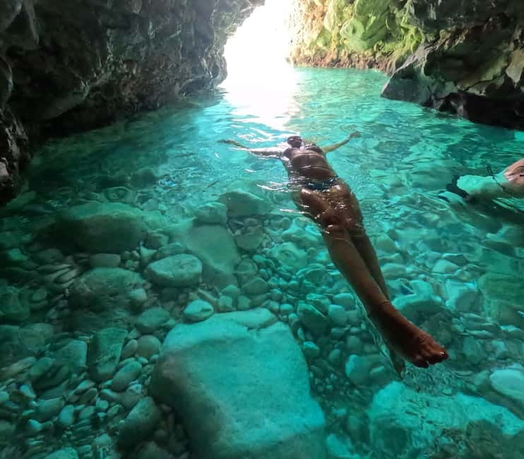 Secret Blue Cave & Grama Bay - Speed Boat Tour - Llovizi Bay and the Blue Cave