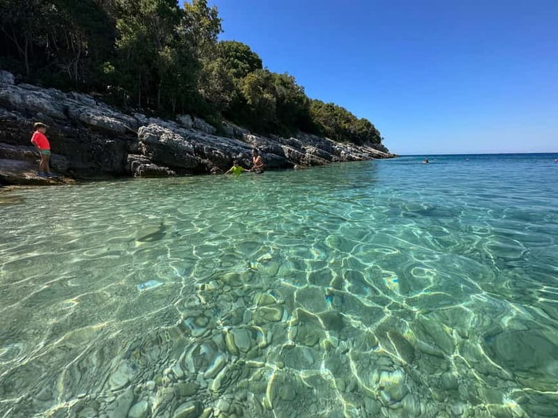 Secret Blue Cave & Grama Bay - Speed Boat Tour - Grama Bay: The Main Event