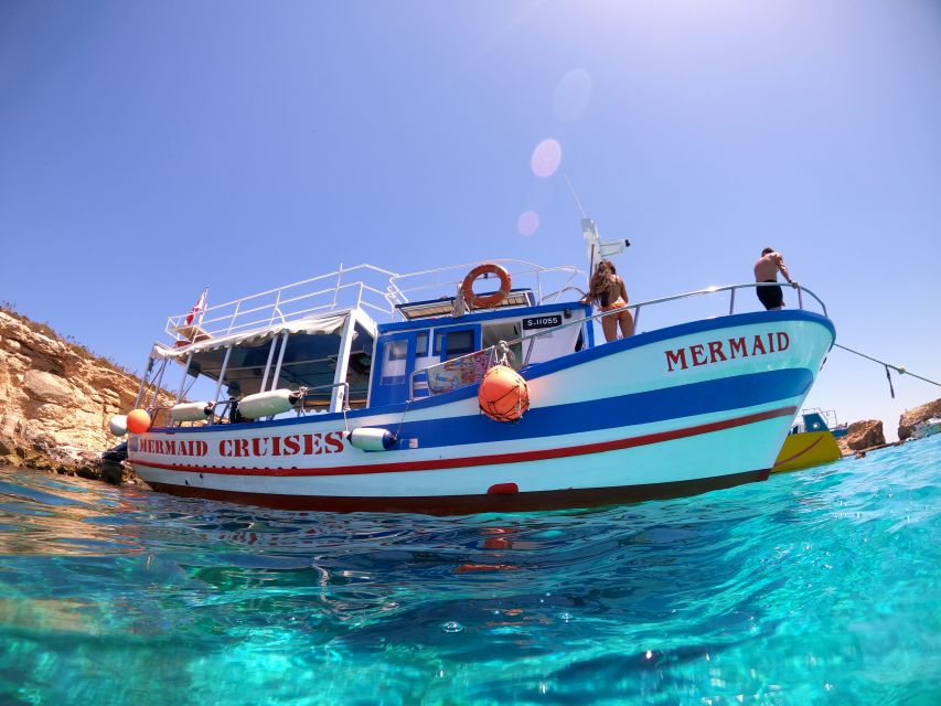 St Paul's Bay: Comino, Blue Lagoon, Gozo, & Caves Boat Tour - The first hour at sea: Malta’s coast from the water