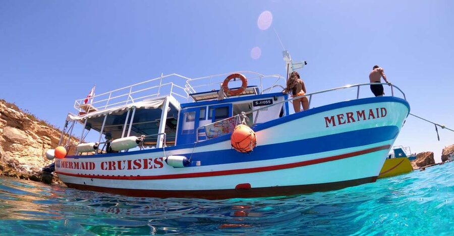 St Paul's Bay: Comino, Blue Lagoon, Gozo, & Caves Boat Tour - Meeting the Mermaid at Bugibba Jetty