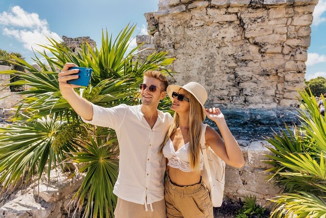 Tulum Day Trip Mayan Ruins and Cenote Swim - Cooling off at Cenote Puerta Maya