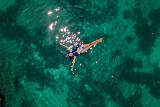 Tulum Guided Tour, Magical Cenote, Lagoon Snorkeling and Beachside Lunch - Yal Ku Lagoon and Beginner-Friendly Snorkeling