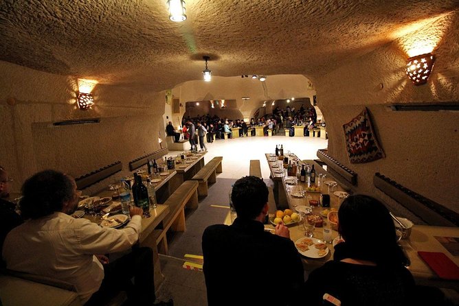 Turkish Night at Cave Restaurant with Dinner and Unlimited Drinks - Entering a Cappadocian cave after dark