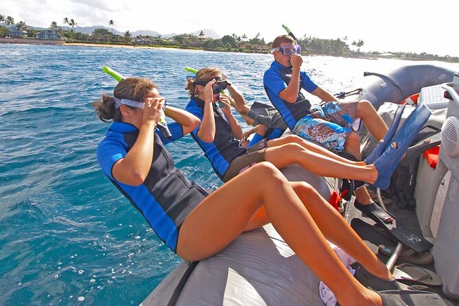 Ultimate Na Pali Coast Zodiac Boat Snorkeling and Sea Cave Tour - Riding along the Na Pali Coast