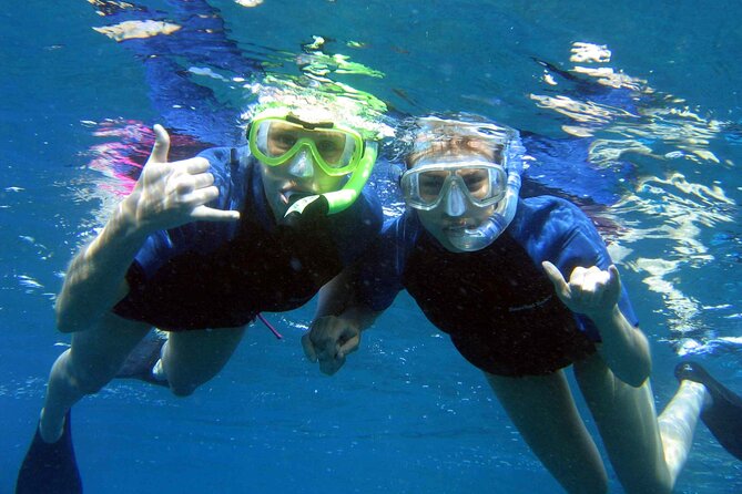 Ultimate Na Pali Coast Zodiac Boat Snorkeling and Sea Cave Tour - Sea caves, waterfalls, and the best photo stops