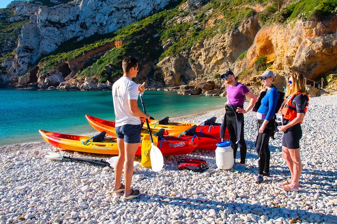 Uncharted Caves & Snorkelling Heaven: Cala Granadella Kayak Tour - Cueva del Llop Mari and the coast’s rock story