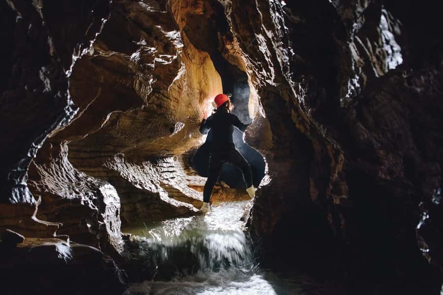 Waitomo Caves Black Abyss Ultimate Caving Experience - A glowworm zipline in the dark