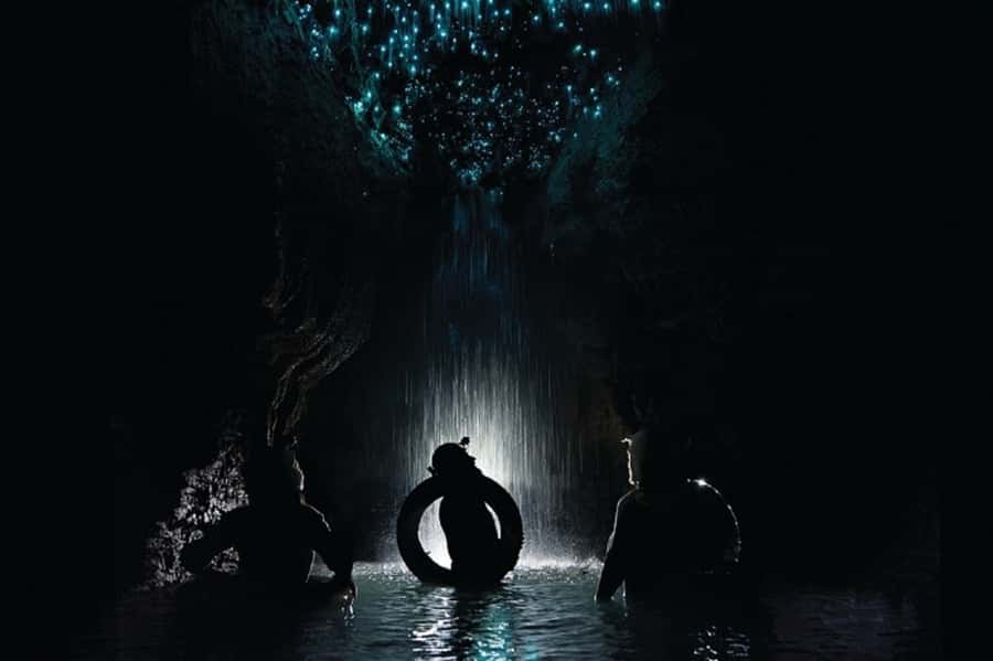 Waitomo Caves Black Abyss Ultimate Caving Experience - Wading, floating, and climbing underground waterfalls