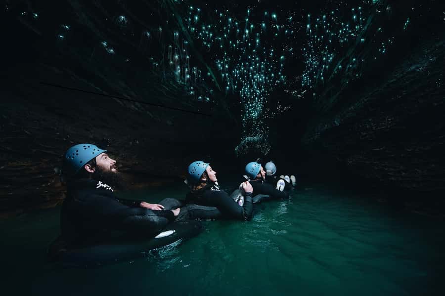 Waitomo Caves: Labyrinth Black Water Rafting Experience - Scrambling through Ruakuri Cave