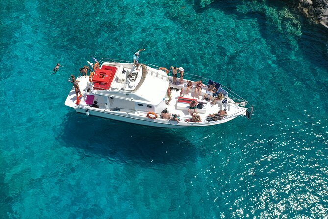 Zakynthos boat tour:Shipwreck& Local blue caves with 3 Swim Stops - Three swim stops and snorkeling time